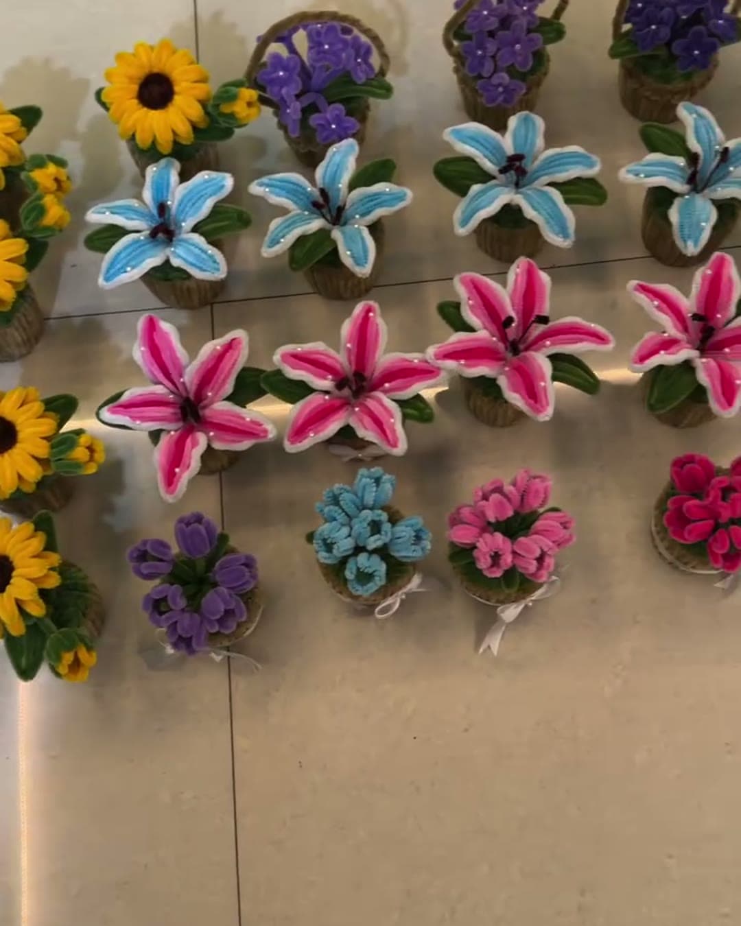 Rows of handmade mini pots ready for a bulk order