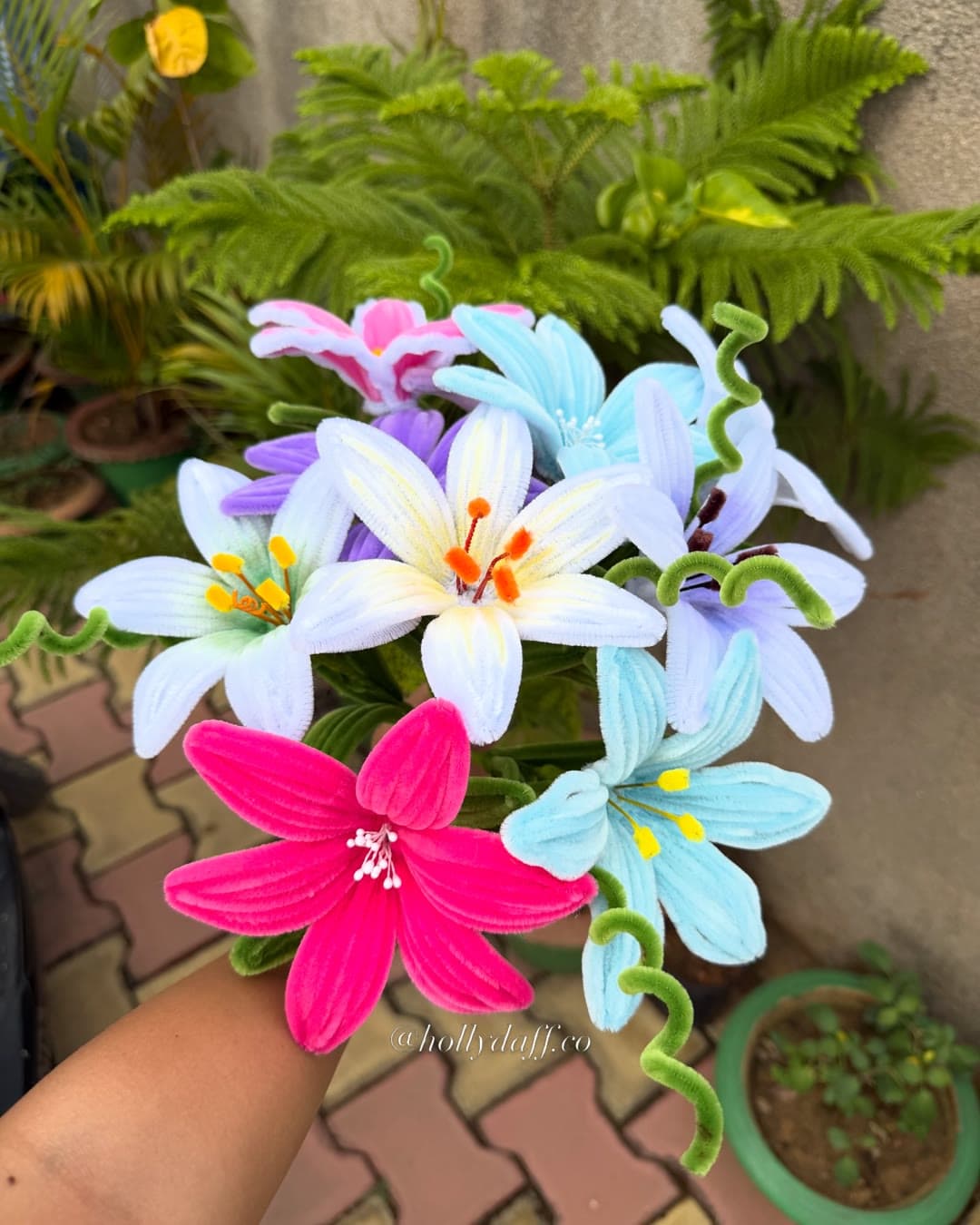 Bunch of handmade lilies in white, magenta and sky blue