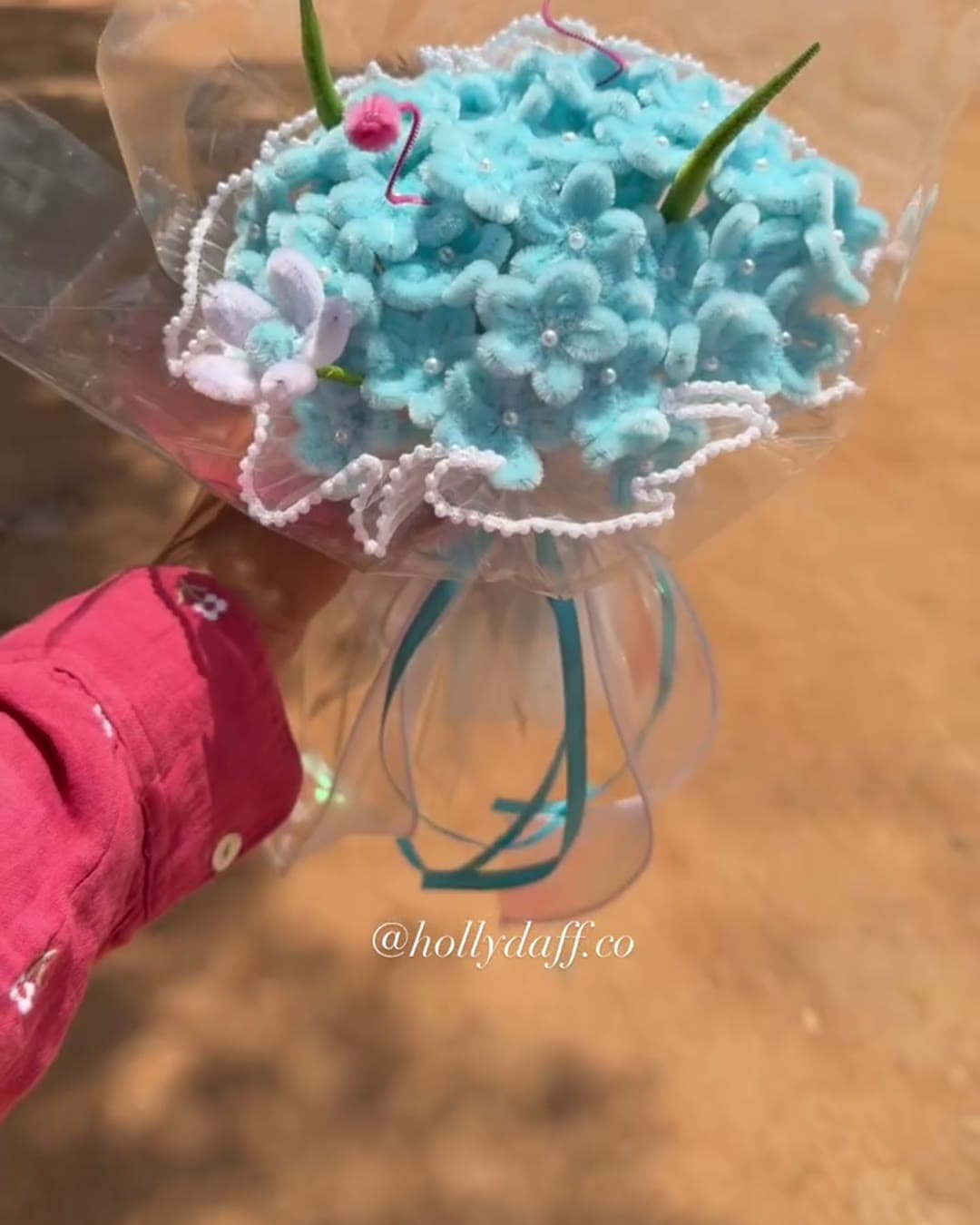 Sky blue handmade bouquet with pearls and ruffled wrap