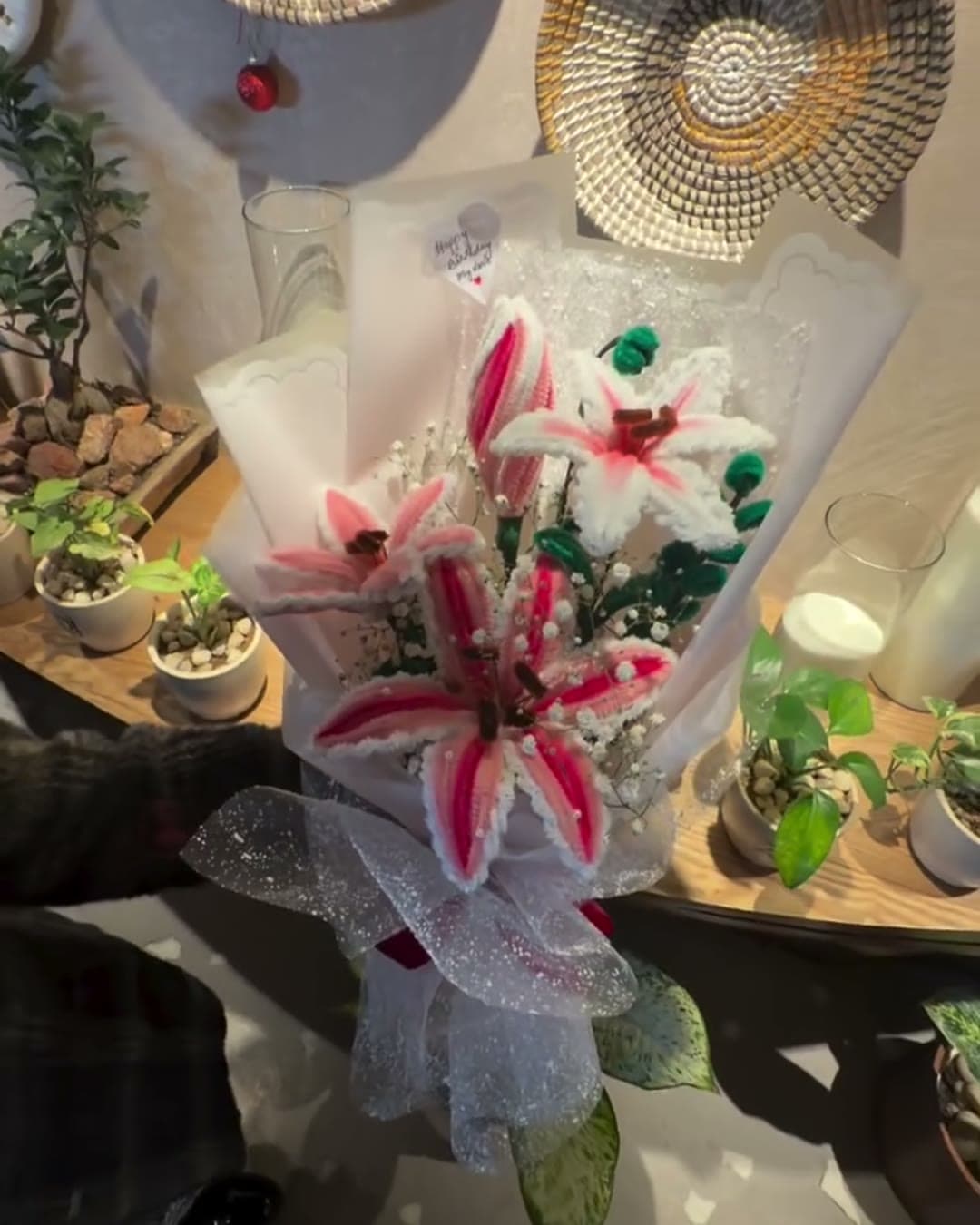 Stargazer lily bouquet in shimmering white wrap