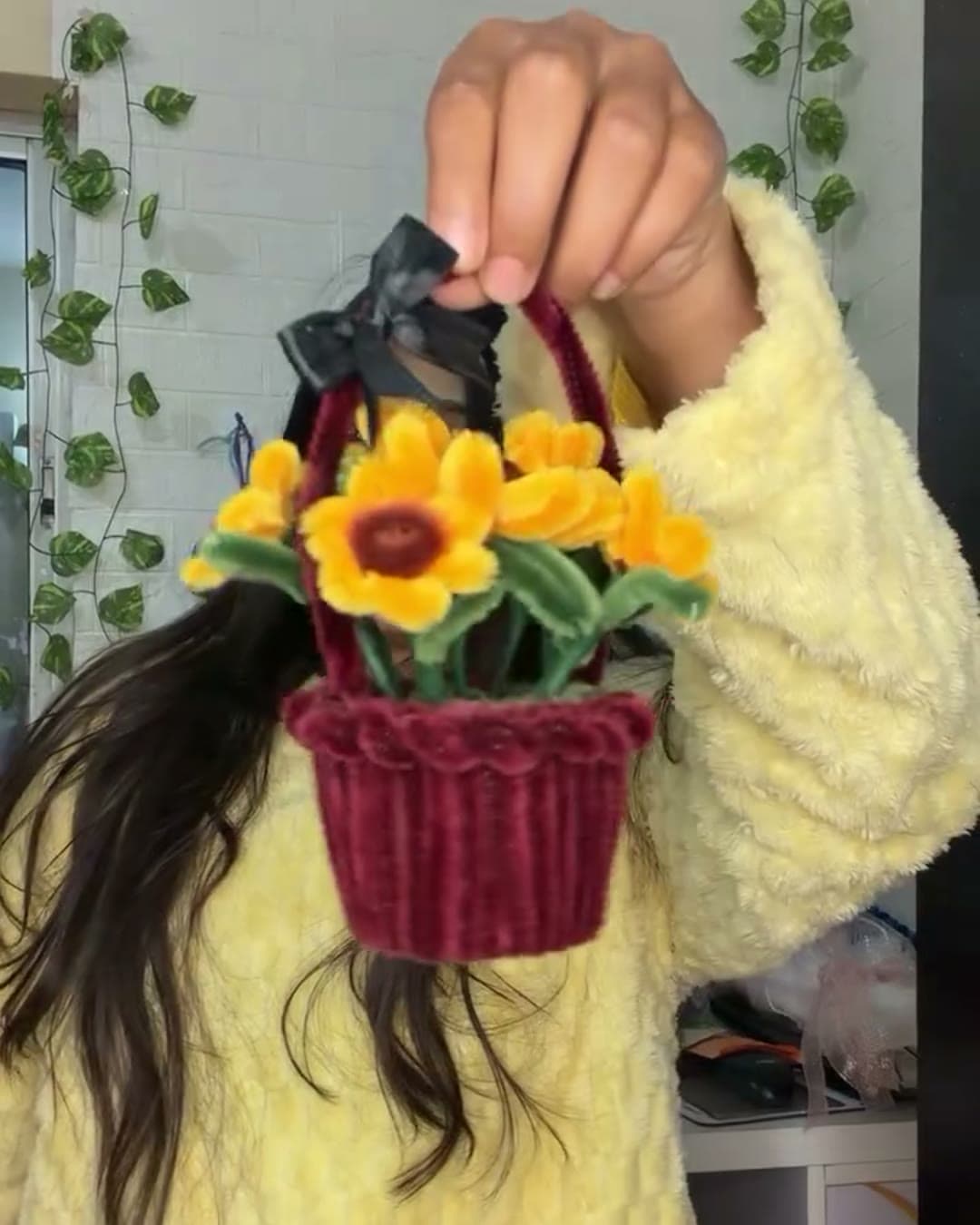 Handmade sunflower basket with a knitted maroon basket
